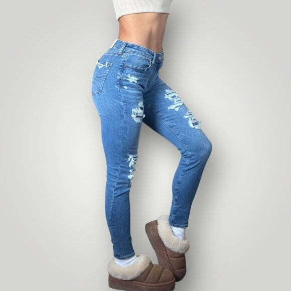 NWT American Eagle Next Level Stretch Ripped Jegging Medium Wash Distressed Sz 6 - Picture 1 of 10